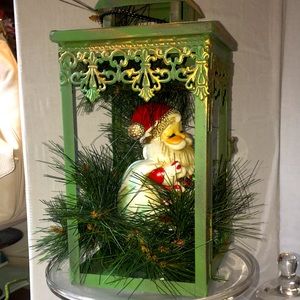 Vintage repurposed Homco Santa in vintage green lantern.